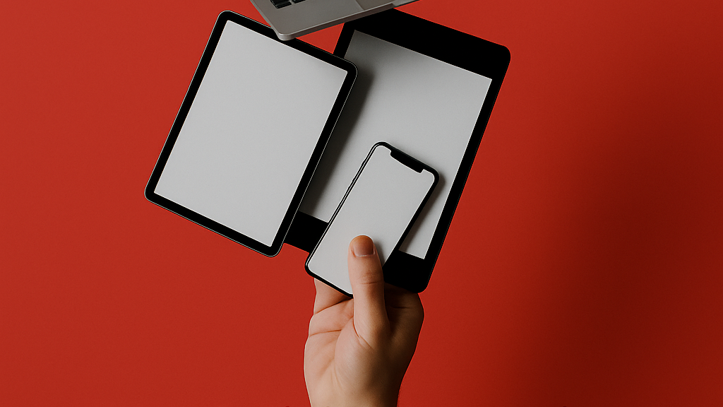Digital marketing for electronics brands in 2025 with devices in hand